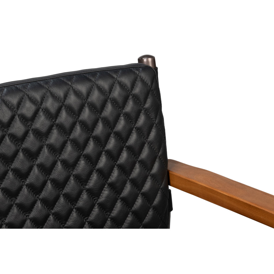 Close-up of quilted backrest on armchair.