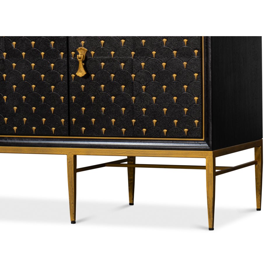 Sideboard legs and base, gold finish close-up.