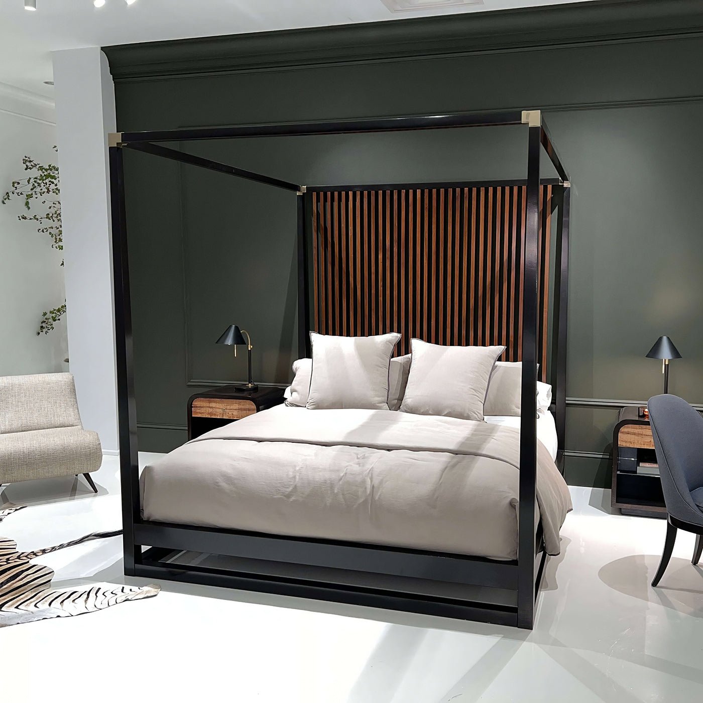 Canopy bed in luxury room, decorative elements.