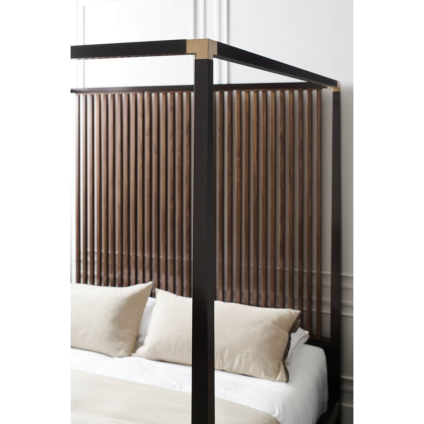 Close-up, canopy bed frame, metal and wood.