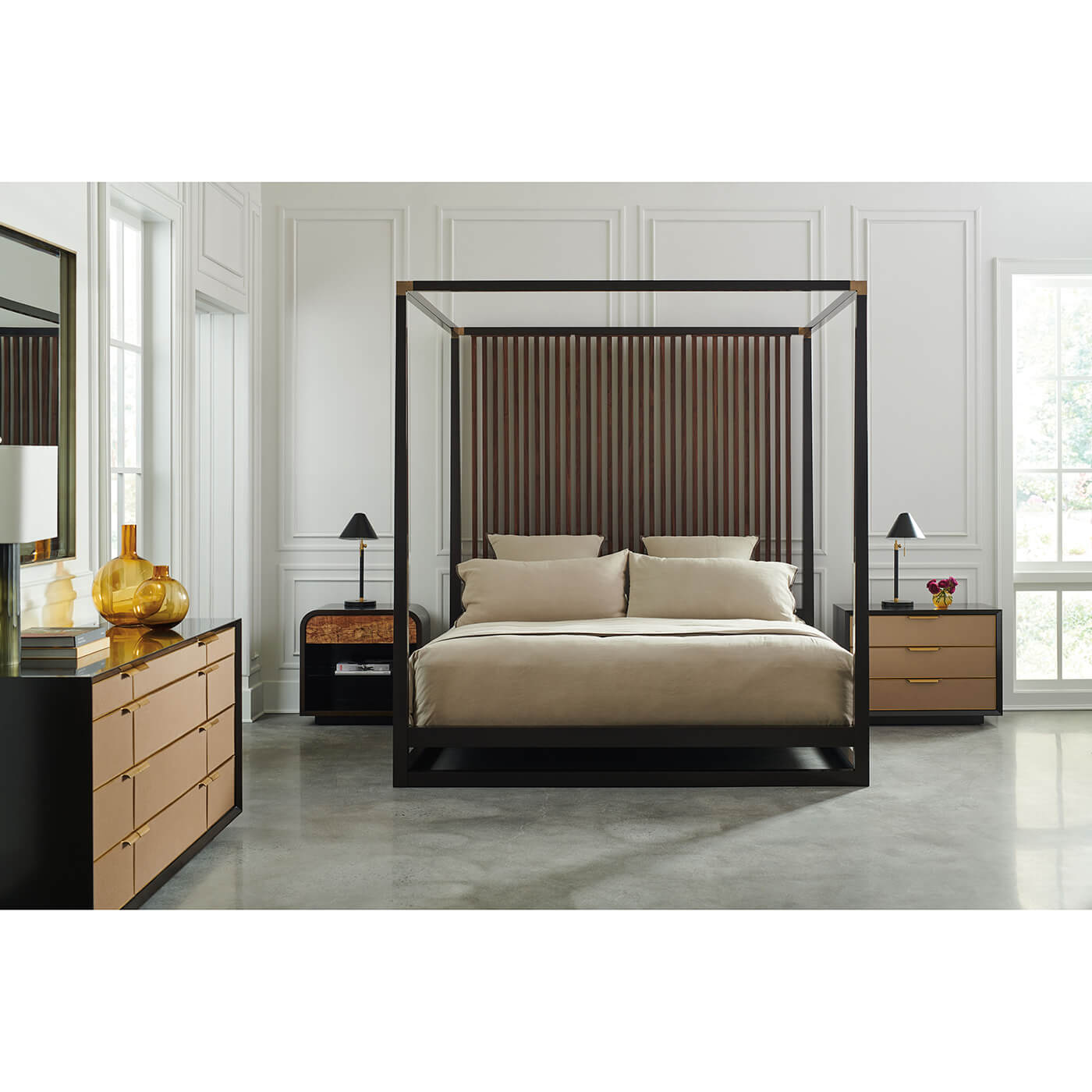 Modern canopy bed in stylish bedroom setting.