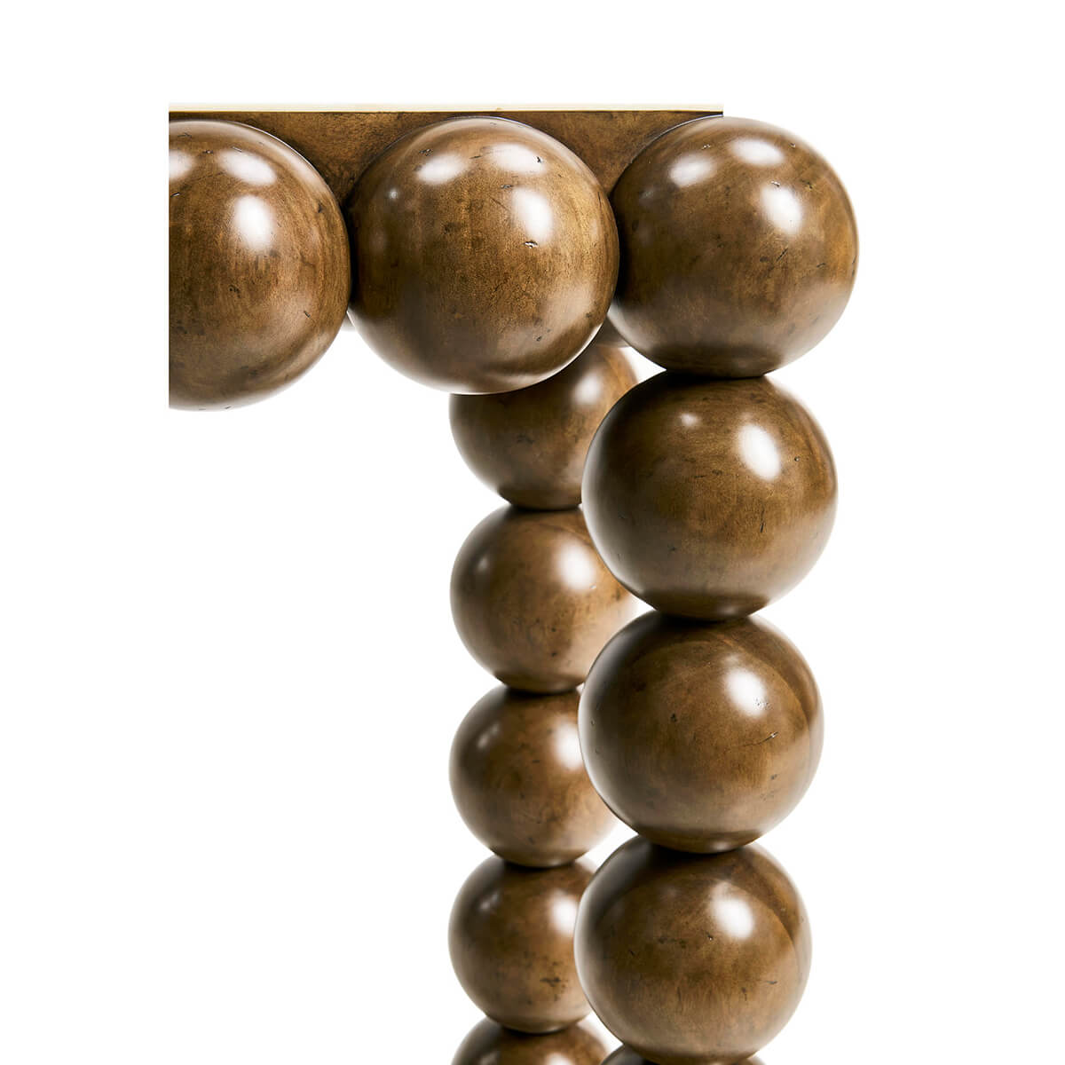 Detailed view of console table leg curvature.