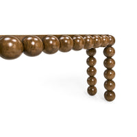 Side angle of console table showcasing leg design.