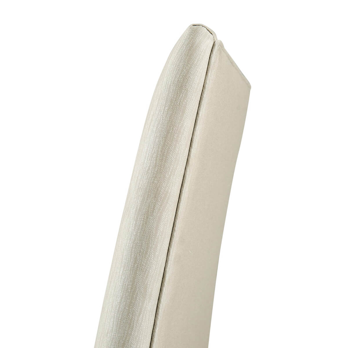 Side detail of cream fabric on mid-century modern chair.