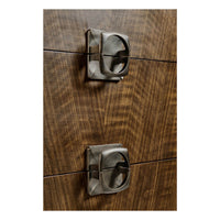 Detailed view of dresser drawer handles, mid century modern style.