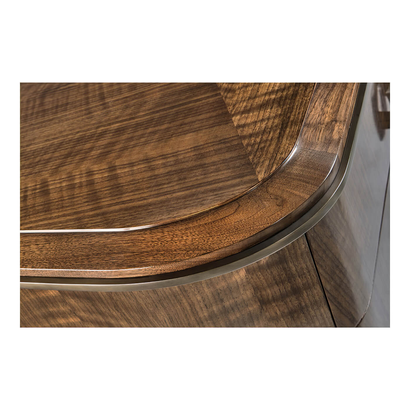 Close-up of dresser wooden edge design detail.