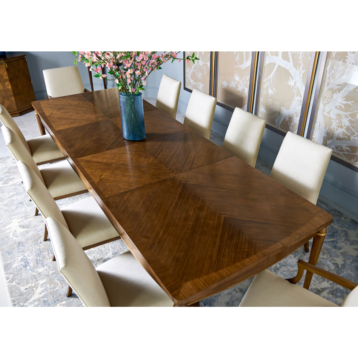 Top view of extended dining table with chairs.