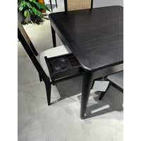 Game table drawer opened showing cup holder insert.