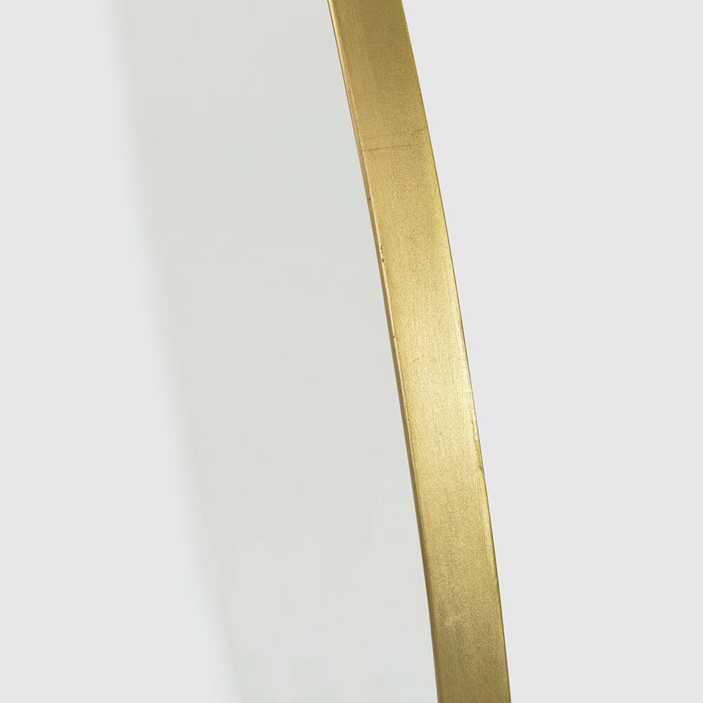 Side view of gilt mirror frame.