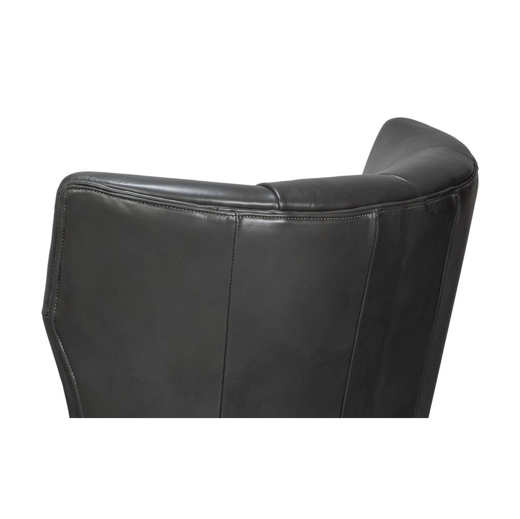 Backrest stitching detail of gray leather armchair.