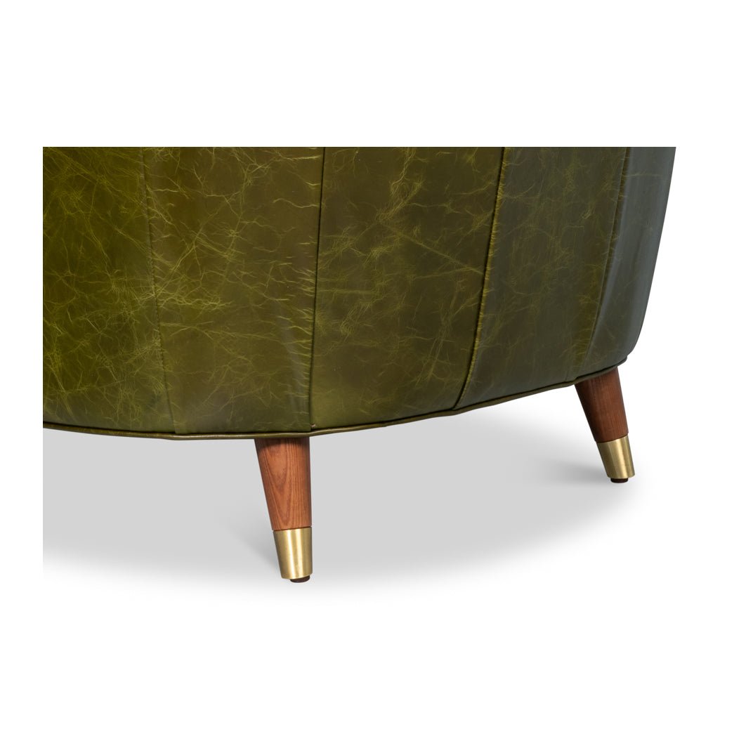Armchair's rear legs with wood and brass finish.