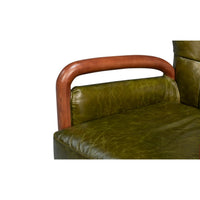 Close-up of armchair's wooden armrest and cushion.