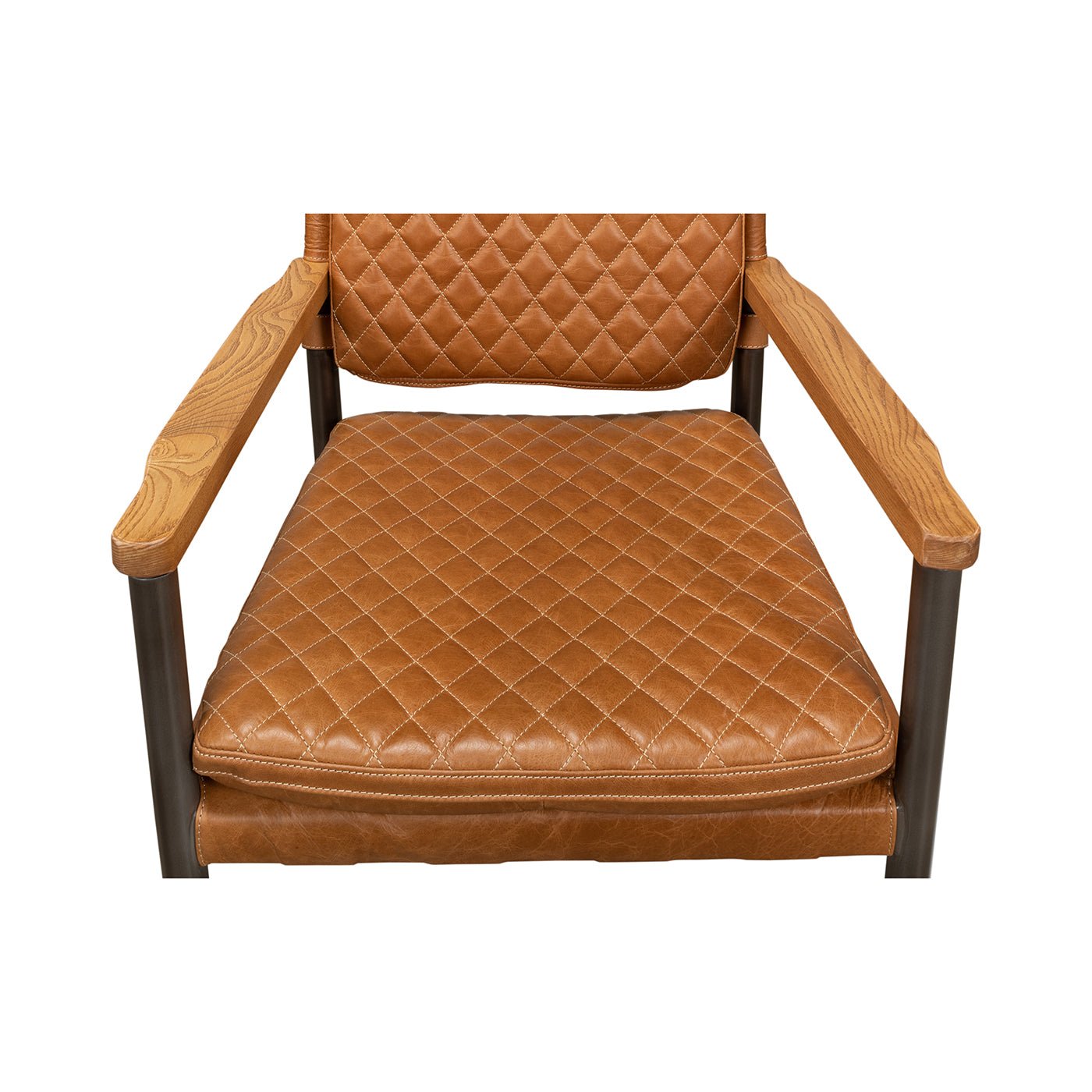 Top view of quilted leather armchair seat and armrests.