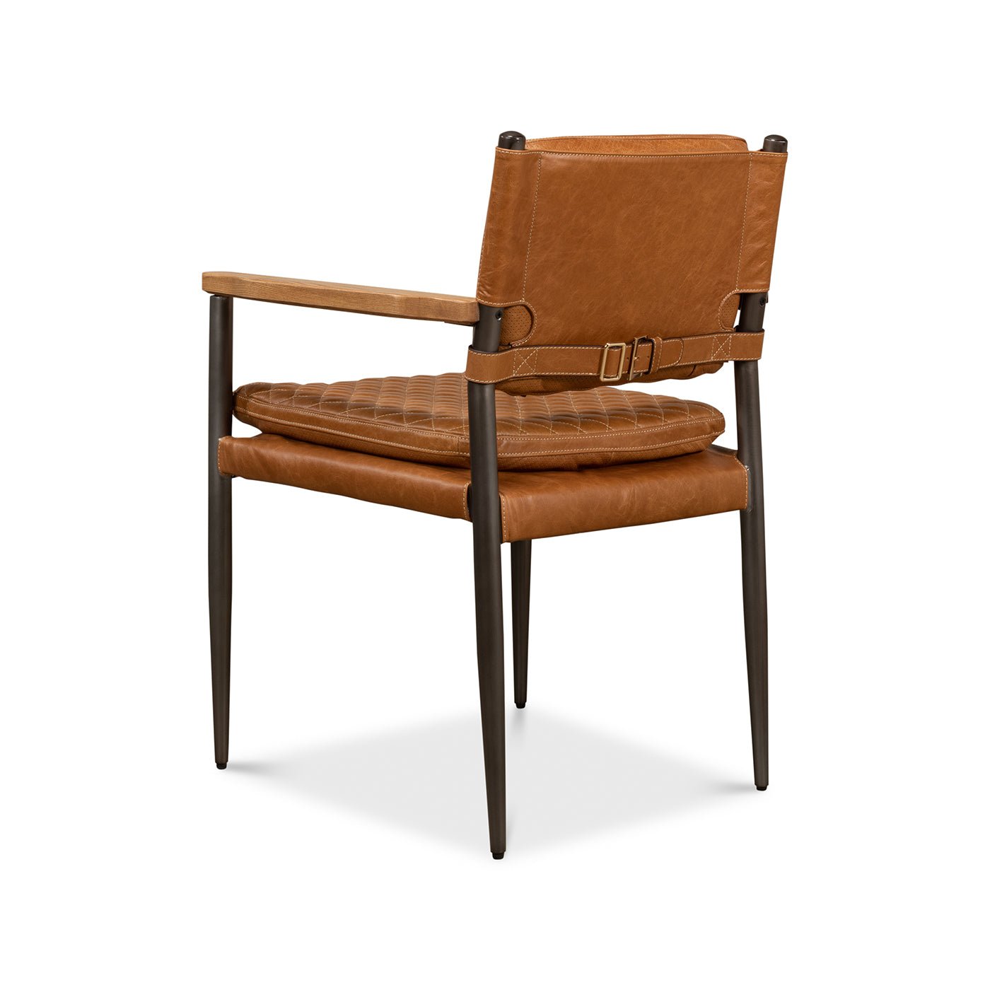 Angled back view of Mid-Century leather armchair, dark legs.