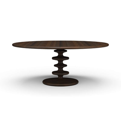 Dark round dining table with unique central pedestal design.