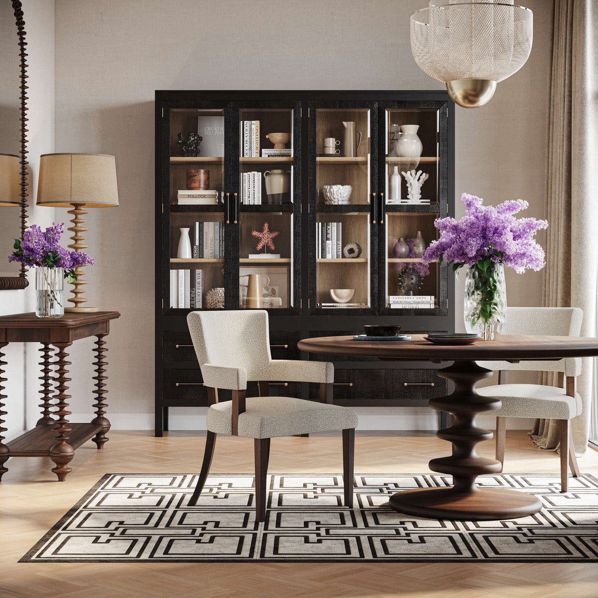 Dining room with modern round table and chairs.