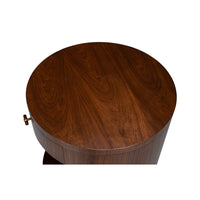 Top view of round end table, wood surface detail.