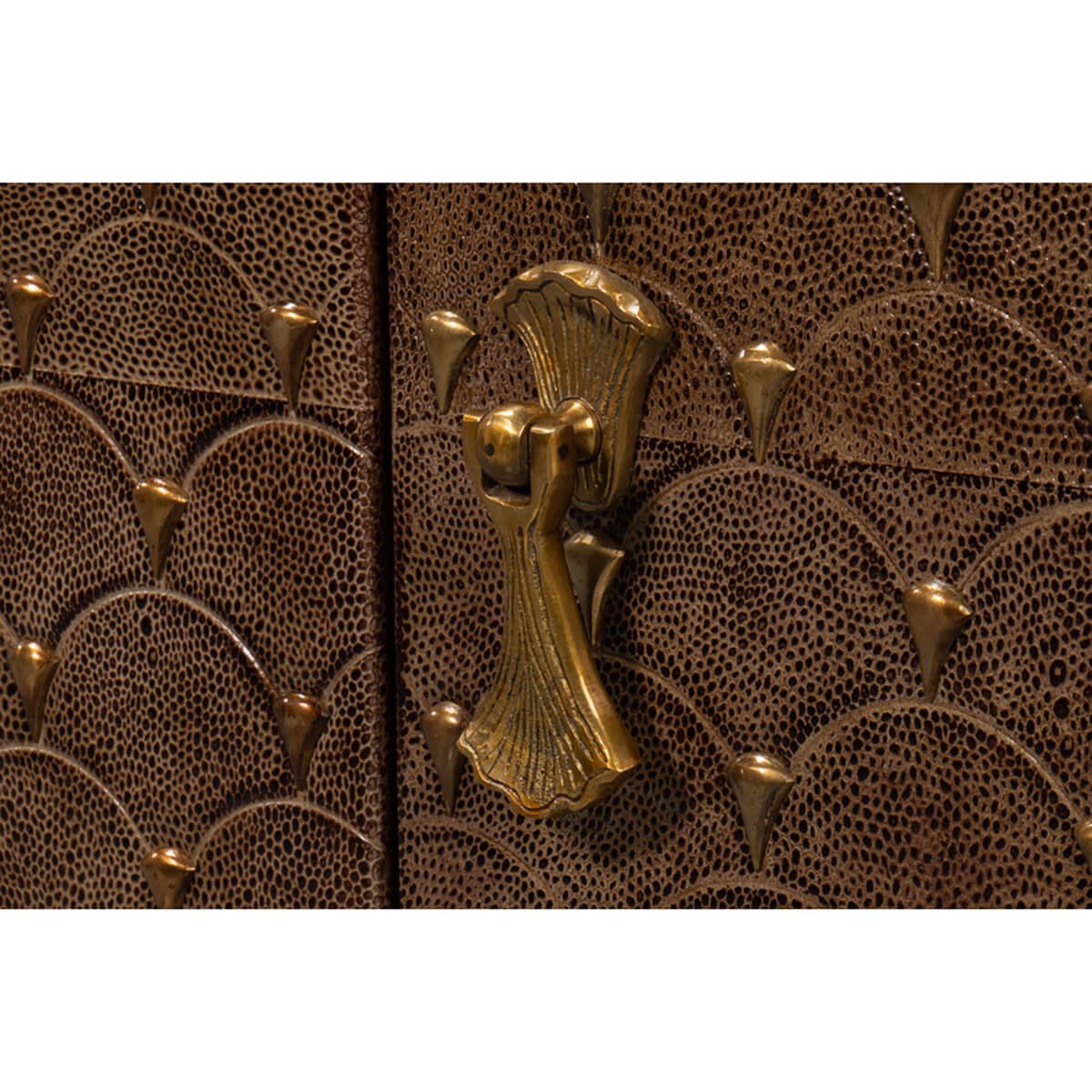 Detailed shot of sideboard door handle and texture.