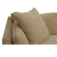Close-up of mid-century modern sofa cushions in yellow.