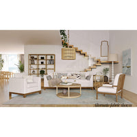 Spacious living area with mid-century modern sofa, alternate fabric.