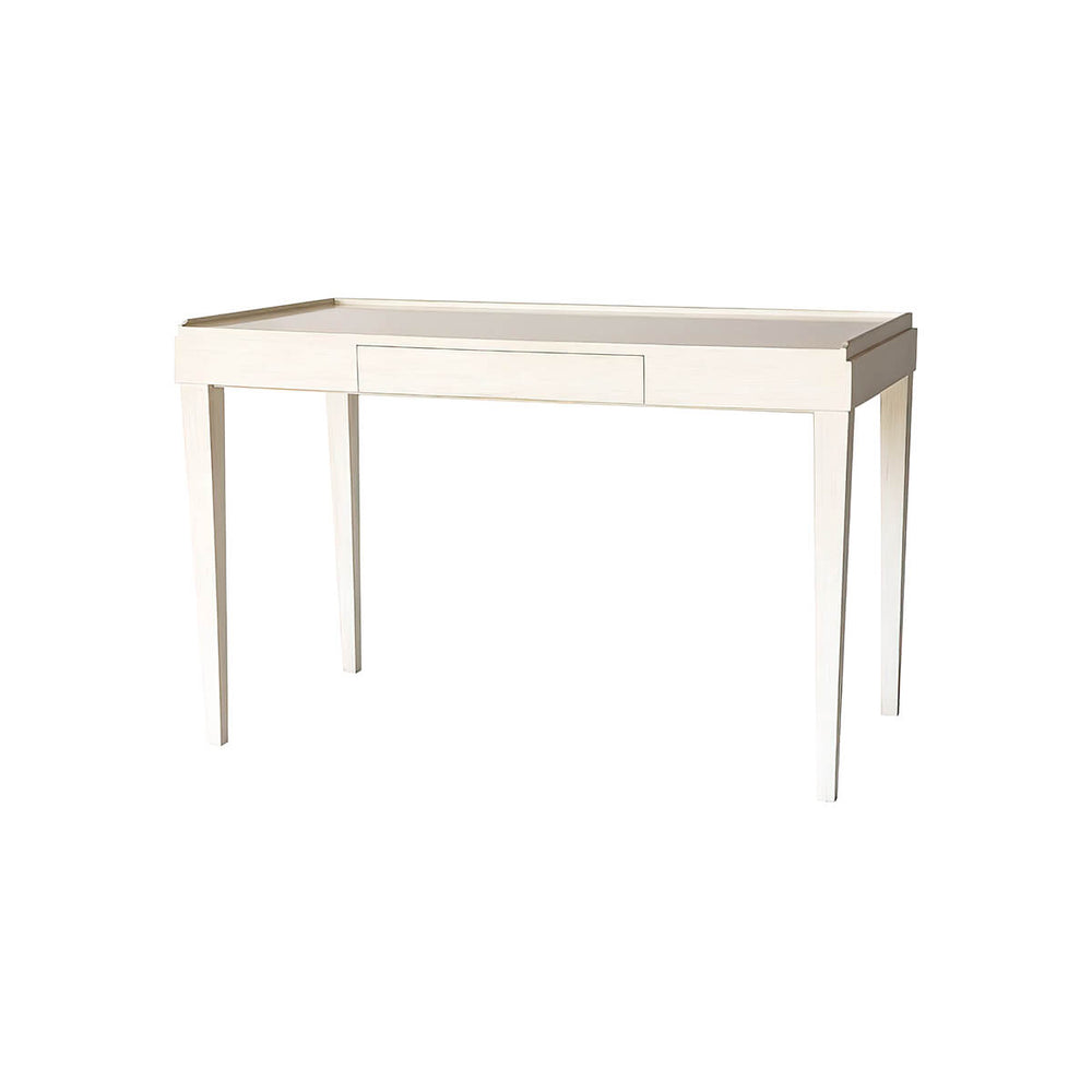 Mid-century modern desk with closed drawer, drift white finish.