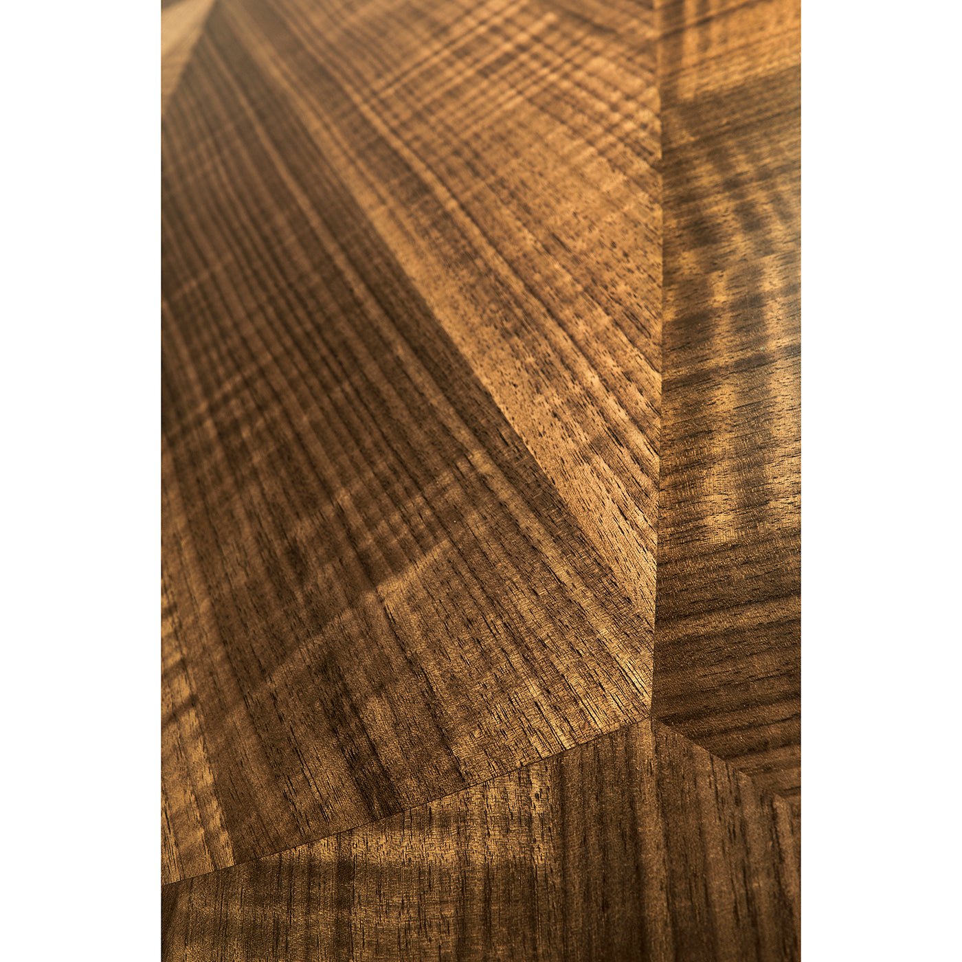 Detailed walnut desk wood grain pattern.