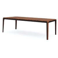 Modern walnut dining table, angled perspective, mid-century design.