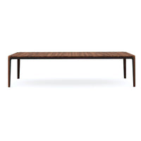 Front view of walnut dining table, mid-century aesthetics.
