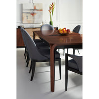 Dining table corner with chairs, modern walnut design.