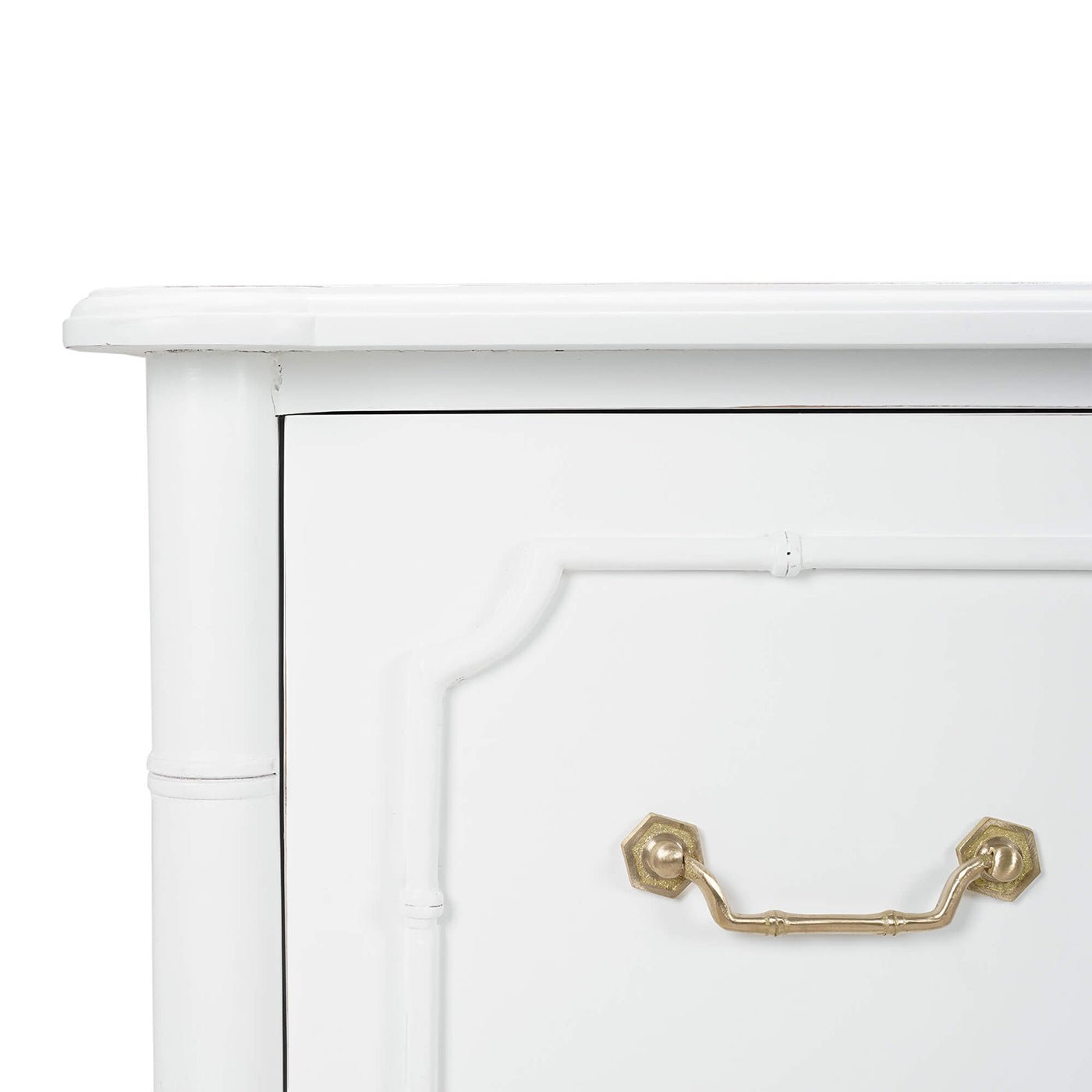 Close-up of white painted dresser corner detail