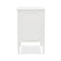 Side view of white painted nightstand, panel design.