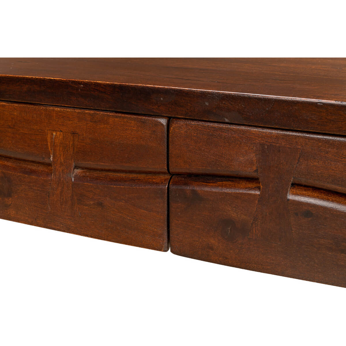 Close-up of mid-century desk drawers, wood texture.