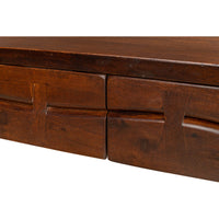 Close-up of mid-century desk drawers, wood texture.