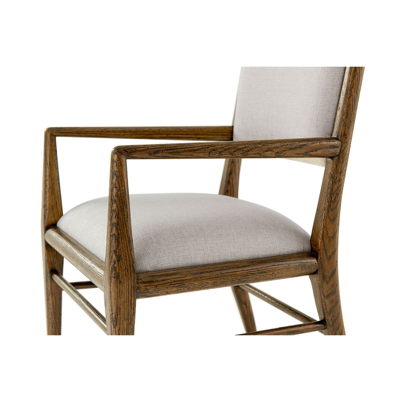 Close-up oak armchair arms, front detail.
