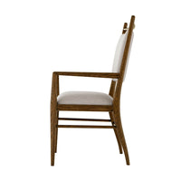 Oak dining armchair, side profile view.