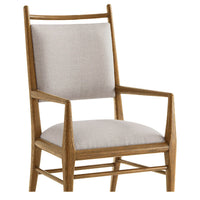Close-up of dining armchair backrest and arms.