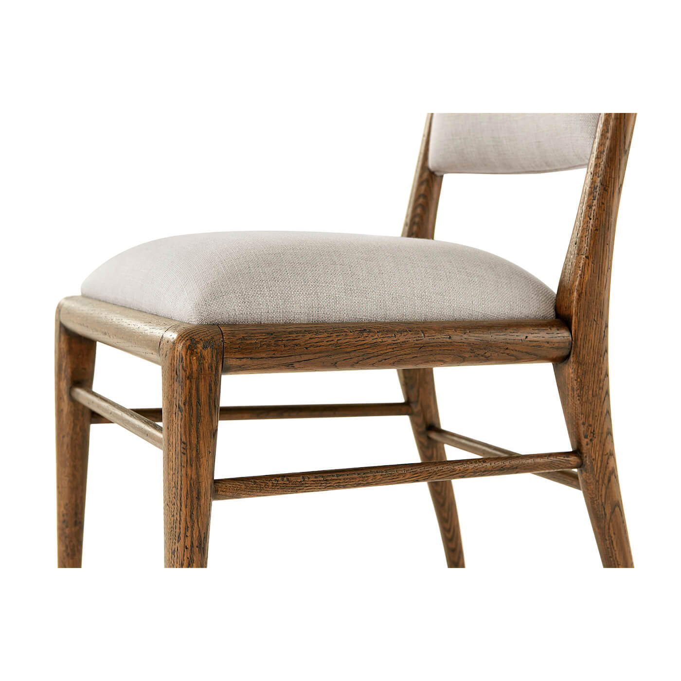 Close-up of seat cushion and wooden frame.
