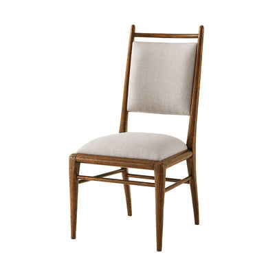 Mid-century oak dining chair front view.