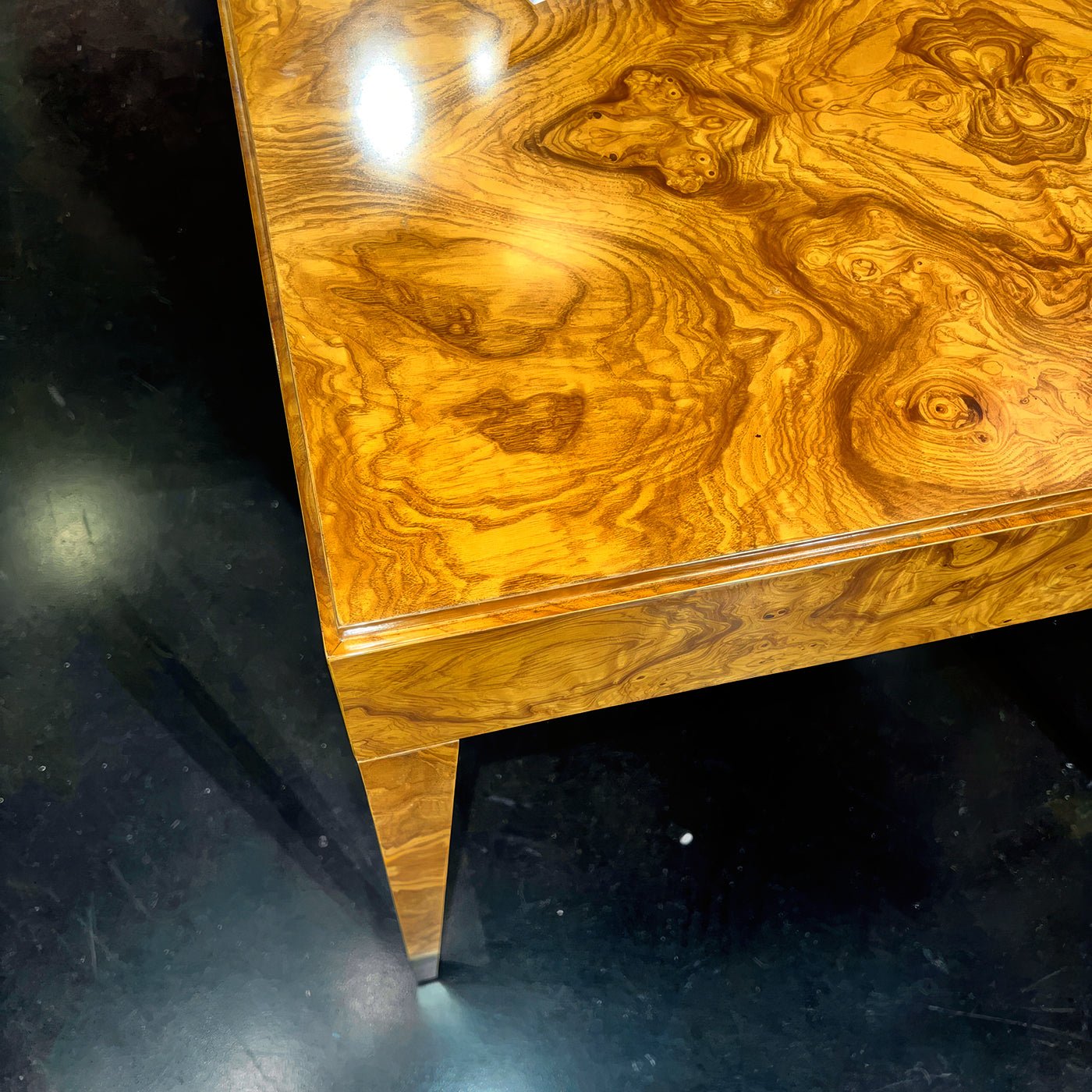 Close-up of olive ash burl side table surface