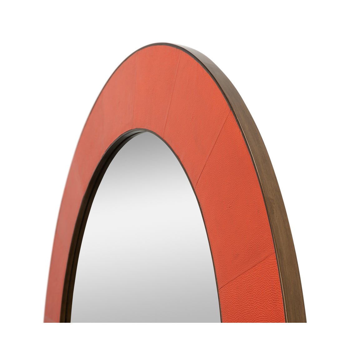 Angled view of orange round mirror's leather and wood details.