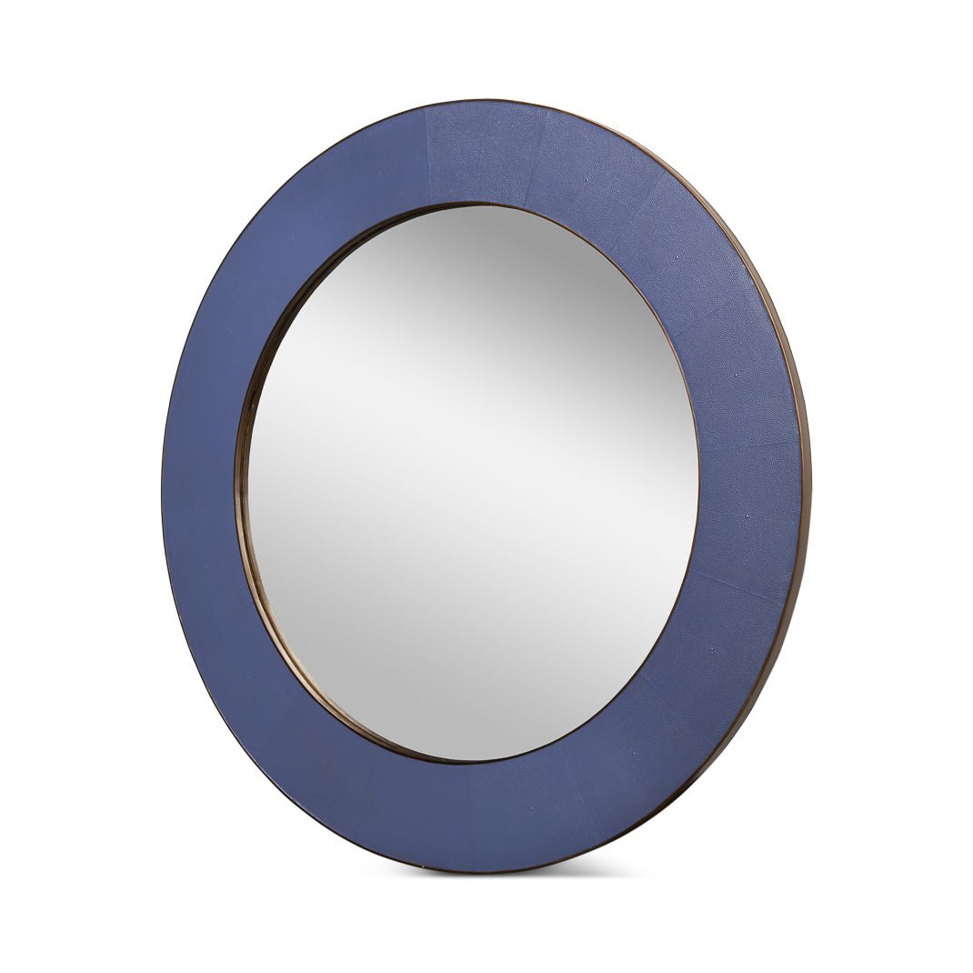 Round purple leather mirror, angled side view, elegant design.
