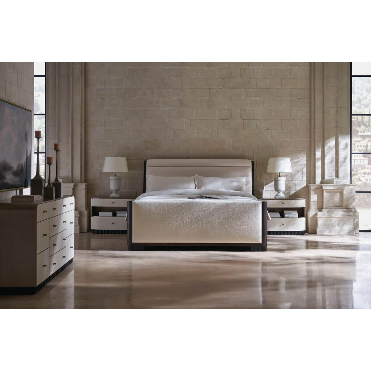 Mid-century queen sleigh bed in stylish bedroom setting.