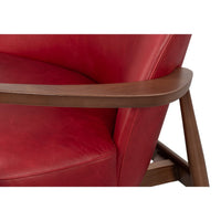 Armrest close-up red leather armchair mid-century.