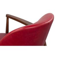 Top back angle red leather armchair mid-century style.