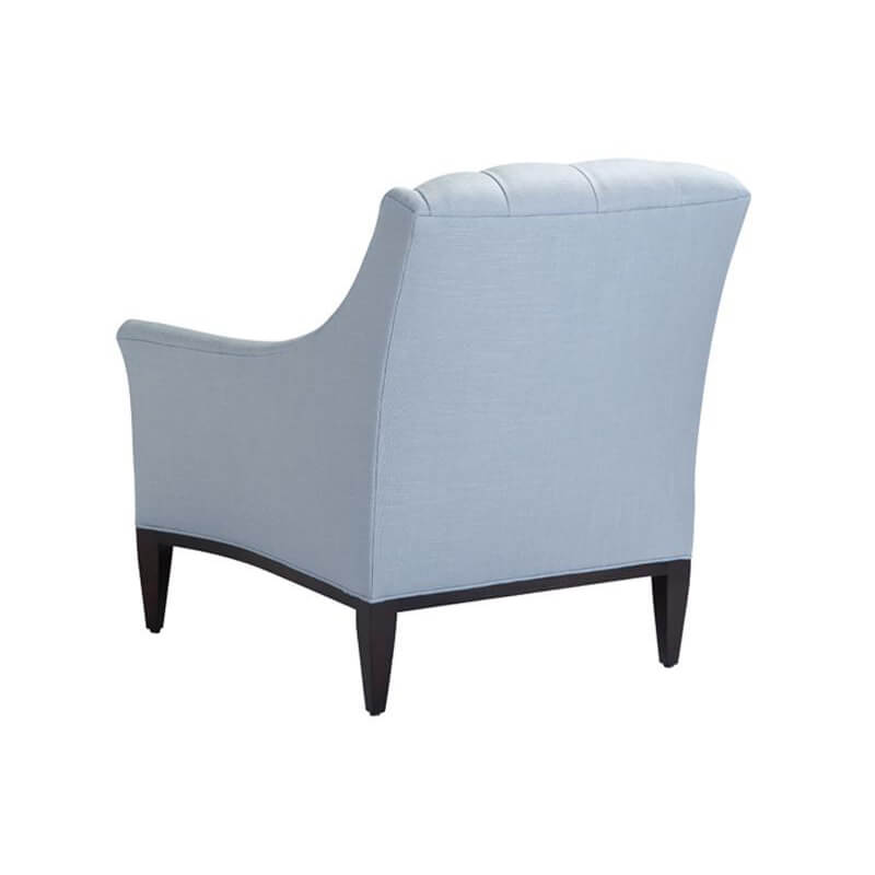Back view of light blue tufted armchair.