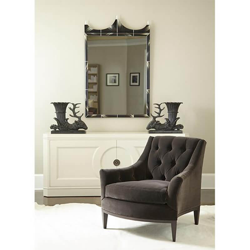 Dark armchair in stylish modern living room.