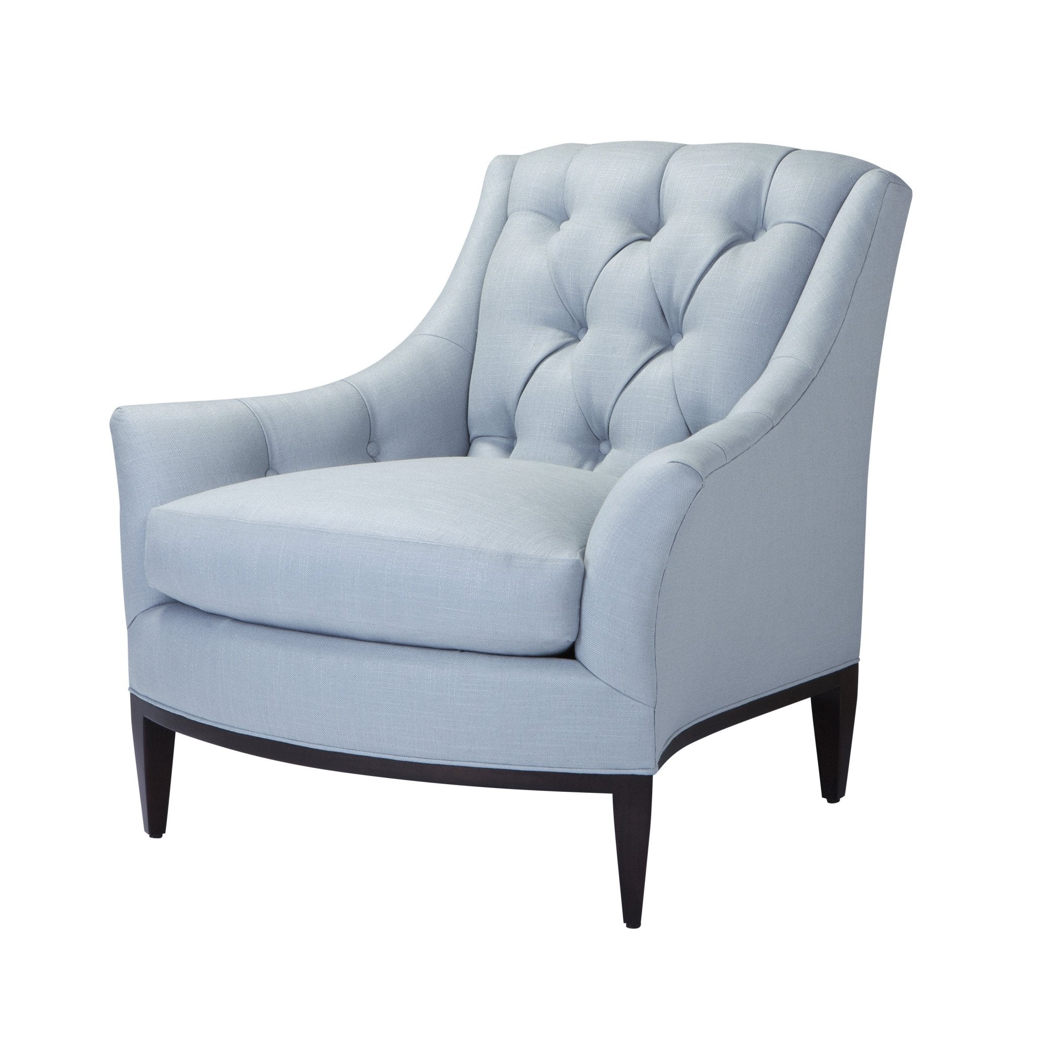 Light blue tufted armchair in angled view.