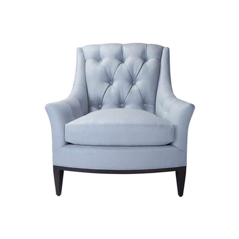 Front view of light blue tufted armchair.