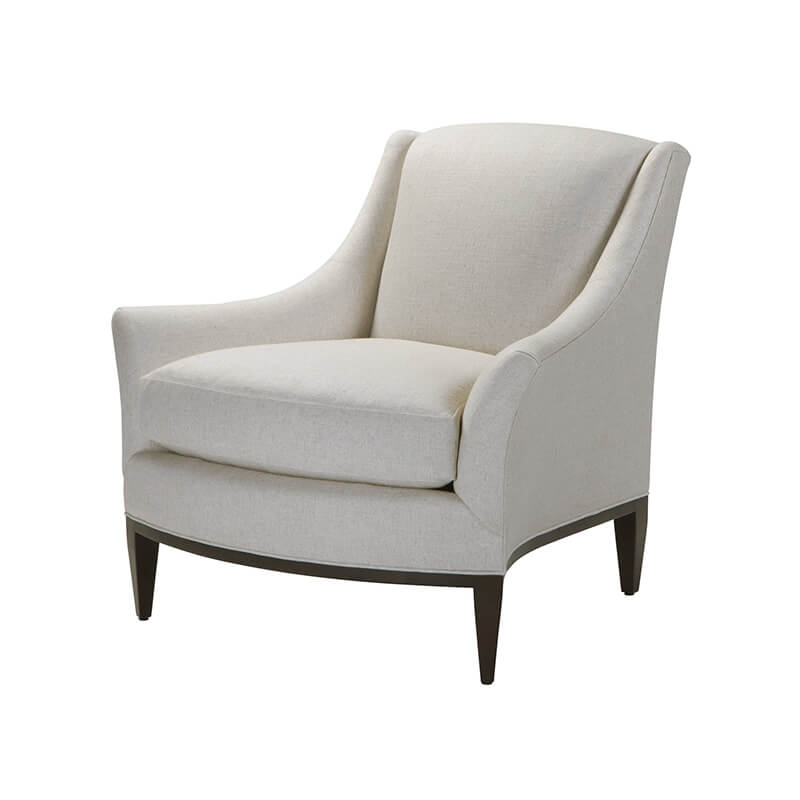 Beige fabric armchair angled view mid-century style.
