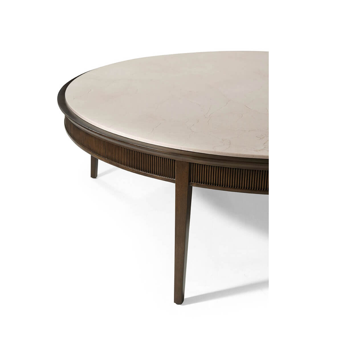 Close-up of round cocktail table leg and edge.